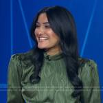 Reena Roy’s green mock neck satin dress on Good Morning America