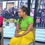 Robin Arzon’s green cropped tee and yellow pleated skirt on Today