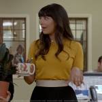 Sam’s yellow top and black grommet trim skirt on Not Dead Yet