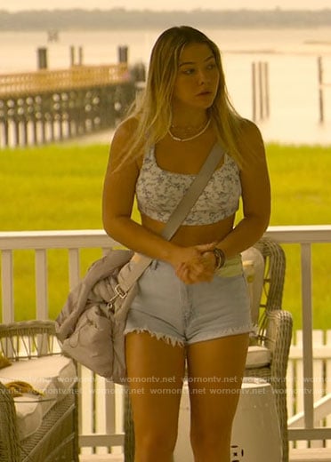 Sarah’s white and blue floral tank top and colorblock denim shorts on Outer Banks