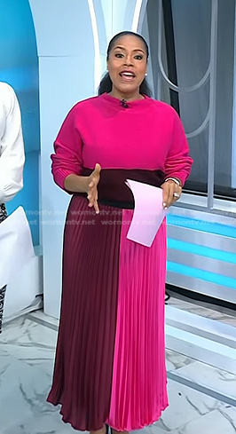 Sheinelle’s pink colorblock sweater and pleated skirt on Today