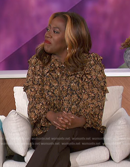 Sheryl’s brown floral print tie neck blouse on The Talk