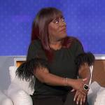 Sheryl’s black feather trim top on The Talk