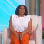 Sherri’s orange pleated pants on Sherri