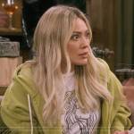 Sophie’s graphic tee and green hoodie on How I Met Your Father
