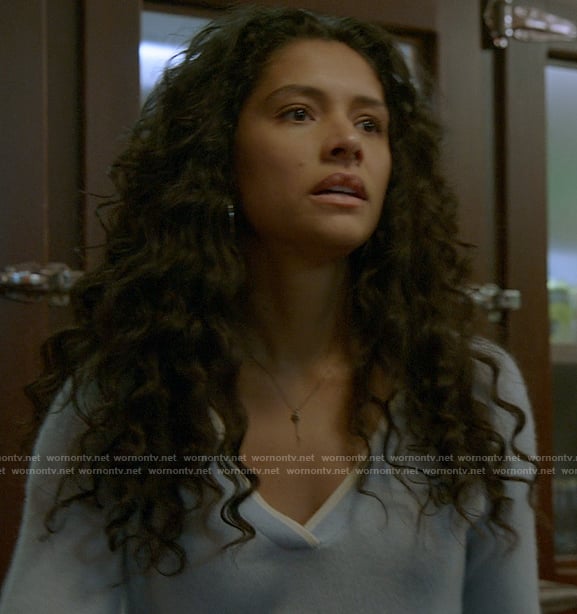 Stella’s light blue sweater with white trim on Chicago Fire