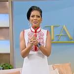 Tamron’s white embroidered mini dress on Tamron Hall Show