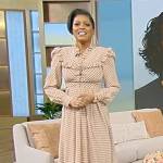 Tamron’s beige polka dot print ruffle dress on Tamron Hall Show