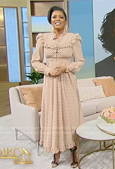 Tamron’s beige polka dot print ruffle dress on Tamron Hall Show