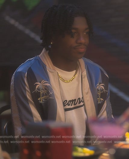 Zeke’s blue palm embroidered bomber jacket on Grown-ish