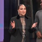 Adrienne’s black blazer on E! News