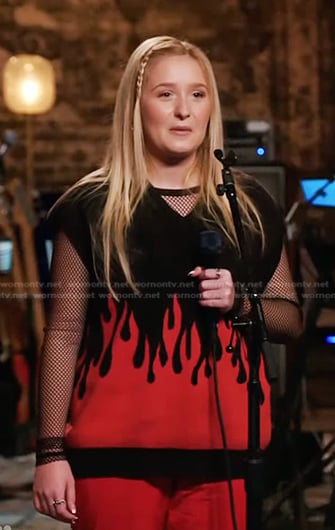 Ana Heichel’s black and red flame vest on The Voice