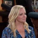 Belle’s blue floral v-neck dress on Days of our Lives