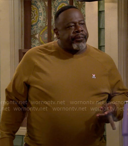 Calvin’s light brown rabbit crossbones sweatshirt on The Neighborhood