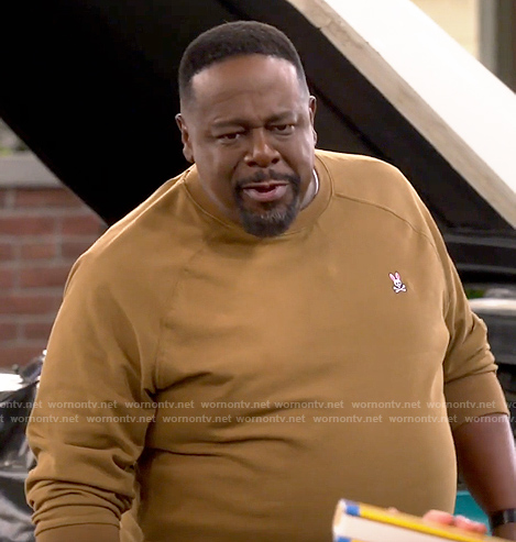 Calvin’s light brown rabbit crossbones sweatshirt on The Neighborhood