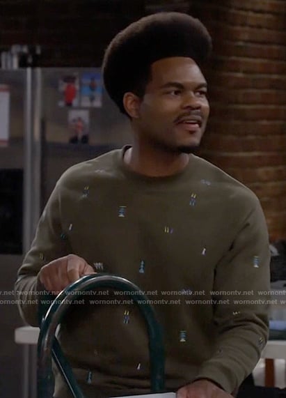 Carter’s green embroidered sweatshirt on Call Me Kat