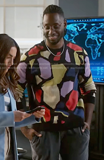 Chester’s colorful print sweater on The Flash