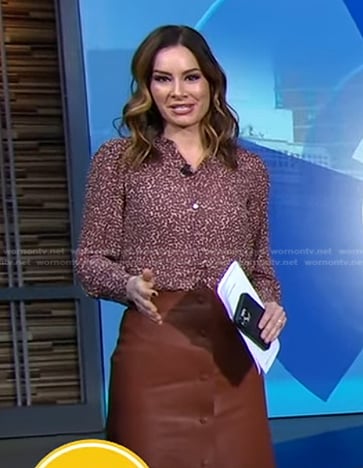 Rebecca’s floral blouse and brown leather skirt on Good Morning America
