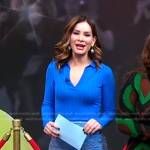 Rebecca’s blue ribbed polo and lace skirt on Good Morning America