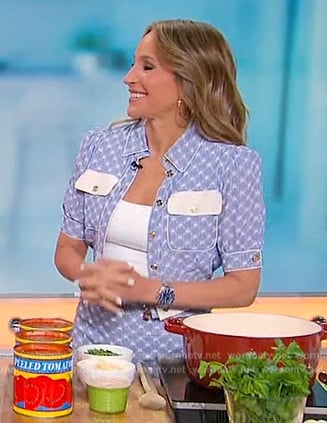 Elaina Scotto’s blue cropped jacket and skirt on Sherri