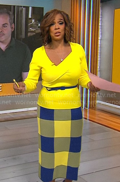 Gayle King’s yellow asymmetric sweater and blue checked skirt on CBS Mornings