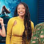 Halle Bailey’s yellow ribbed cutout sweater on Access Hollywood