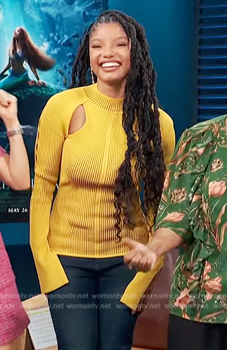 Halle Bailey’s yellow ribbed cutout sweater on Access Hollywood