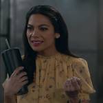 Helen’s yellow floral top on True Lies