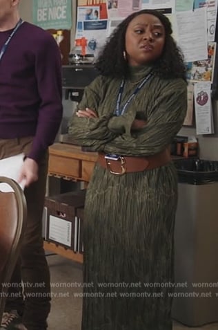 Janine’s green printed mock neck dress on Abbott Elementary