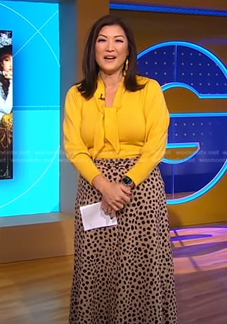 Juju’s yellow tie neck sweater and leopard belted skirt on Good Morning America
