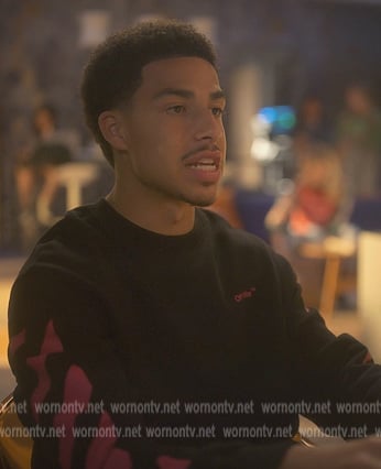 Junior’s black Off-White logo sweater on Grown-ish