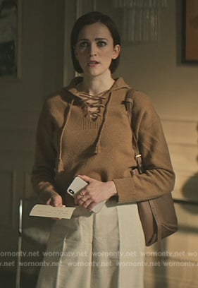 Kate’s brown lace-up sweater on You