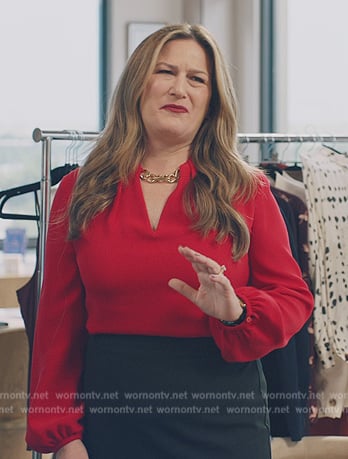 Katherine’s red chain link blouse on American Auto