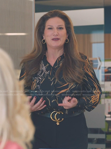 Katherine’s black tiger print blouse on American Auto