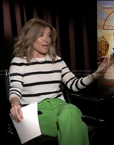 Kit’s white striped sweater and green flare pants on Access Hollywood