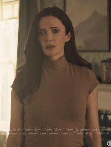Lois’s brown mock neck top on Superman and Lois