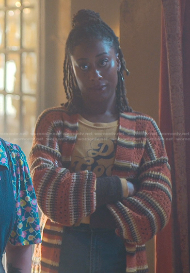 Malika’s orange top and striped knitted cardigan on Good Trouble