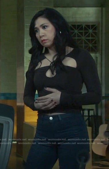 Mel’s criss cross cutout top on The Equalizer