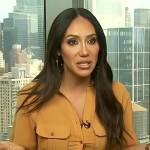 Melissa Gorga’s beige utility shirtdress on Extra