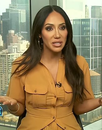 Melissa Gorga’s beige utility shirtdress on Extra