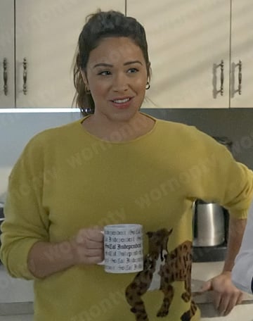 Nell’s yellow leopard graphic sweater on Not Dead Yet