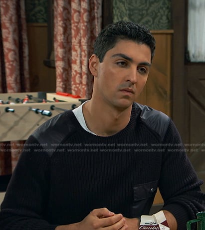 Parker’s black knit swetaer on Bunkd