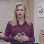 Sadie’s maroon blouse on American Auto