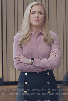 Saddie’s pink blouse and skirt on American Auto