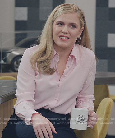 Sadie’s pink button down blouse on American Auto