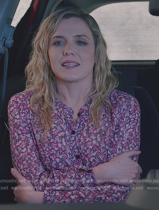 Sadie’s pink floral print blouse on American Auto