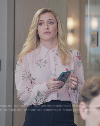 Sadie’s pink floral print blouse on American Auto