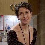 Sarah’s black floral top on Days of our Lives