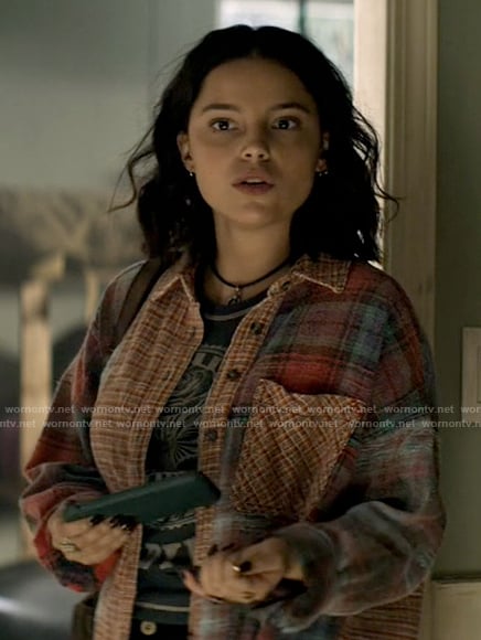 Sarah’s patchwork plaid shirt and Bob Dylan tank top on Superman and Lois