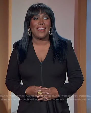 Sheryl’s black peplum jacket on The Talk
